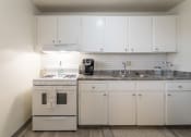 Thumbnail 2 of 56 - This is a photo of the kitchen of the 1 bedroom, 631 square foot model apartment at Lake of the Woods Apartments in Cincinnati, OH.