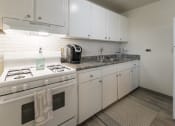 Thumbnail 17 of 56 - This is a photo of the kitchen of the 1 bedroom, 631 square foot model apartment at Lake of the Woods Apartments in Cincinnati, OH.