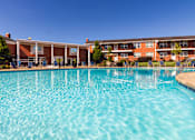 Thumbnail 7 of 59 - Sparkling community swimming pool at Lake of the Woods Apartments in Mount Healthy, Ohio