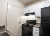 Thumbnail 18 of 70 - This is a photo the kitchen of the 1030 square foot, Oak 2 bedroom, 1 bath apartment at Montana Valley Apartments in the Westwood neighborhood of Cincinnati, OH.