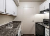 Thumbnail 16 of 70 - This is a photo the kitchen of the 1030 square foot, Oak 2 bedroom, 1 bath apartment at Montana Valley Apartments in the Westwood neighborhood of Cincinnati, OH.