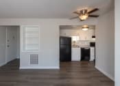 Thumbnail 8 of 70 - This is a photo of the living room kitchen in an upgraded 500 square foot 1 bedroom, 1 bath Cedar floor plan at Montana Valley Apartments in Cincinnati, OH.