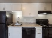 Thumbnail 6 of 70 - This is a photo of the kitchen in an upgraded 500 square foot 1 bedroom, 1 bath Cedar floor plan at Montana Valley Apartments in Cincinnati, OH.