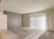 Thumbnail 46 of 70 - This is a photo the living room with painted brick accent wall of the 833 square foot Chestnut, 2 bedroom apartment at Montana Valley Apartments in Cincinnati, OH.