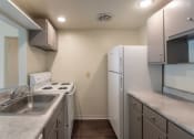 Thumbnail 13 of 70 - This is a photo the kitchen of the 833 square foot Chestnut, 2 bedroom apartment at Montana Valley Apartments in Cincinnati, OH.