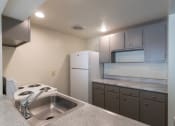 Thumbnail 14 of 70 - This is a photo the kitchen of the 833 square foot Chestnut, 2 bedroom apartment at Montana Valley Apartments in Cincinnati, OH.