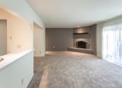 Thumbnail 28 of 70 - This is a photo the living room with brick wall and wood-burning fireplace of the 925 square foot, Hazelnut 2 bedroom, 1 bath apartment at Montana Valley Apartments in the Westwood neighborhood of Cincinnati, OH.