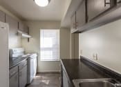 Thumbnail 37 of 70 - This is a photo of the kitchen of the 1310 square foot 3 bedroom, 1.5 bath Pine floor plan at Montana Valley Apartments in Cincinnati, OH.