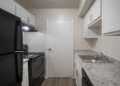 Thumbnail 1 of 70 - This is a photo the kitchen of an upgraded 1030 square foot, Oak 2 bedroom, 1 bath apartment at Montana Valley Apartments in the Westwood neighborhood of Cincinnati, OH.
