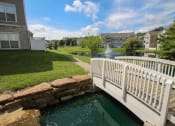 Thumbnail 135 of 147 - This is a picture of a bridge, pond with a fountain and  building exteriors at Nantucket Apartments, in Loveland, OH.