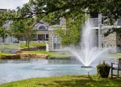 Thumbnail 138 of 147 - This is a picture of a pond with a fountain and  building exteriors at Nantucket Apartments, in Loveland, OH.