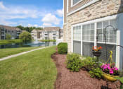Thumbnail 139 of 147 - This is a picture of a pond with a fountain and  building exteriors at Nantucket Apartments, in Loveland, OH.