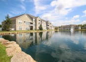 Thumbnail 134 of 147 - This is a picture of a pond with a fountain and  building exteriors at Nantucket Apartments, in Loveland, OH.
