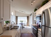Thumbnail 71 of 147 - This is a photo of the dining area from the kitchen in the 1016 square foot, 2 bedroom, 2 bath Nautica floor plan at Nantucket Apartments in Loveland, OH.