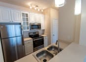 Thumbnail 9 of 147 - This is a photo of the kitchen in the 563 square foot, 1 bedroom, 1 bath Catamaran floor plan at Nantucket Apartments in Loveland, OH.