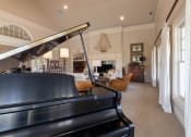 Thumbnail 103 of 147 - This is a photo of the clubhouse piano room at Nantucket Apartments in Loveland, Ohio.