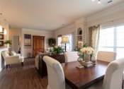 Thumbnail 31 of 147 - This is a photo of the dining area and living room in the 2 bedroom, 2 bath Islander floor plan at Nantucket Apartments in Loveland, OH.