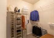 Thumbnail 45 of 147 - This is a photo of the second bedroom walk-in closet in the 2 bedroom, 2 bath Islander floor plan at Nantucket Apartments in Loveland, OH.