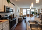 Thumbnail 51 of 147 - This is a photo of the kitchen in the 1242 square foot, 2 bedroom, 2 and 1/2 bath Spinnaker floor plan at Nantucket Apartments in Loveland, OH.