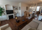 Thumbnail 54 of 147 - This is a photo of the living room in the 1242 square foot, 2 bedroom, 2 and 1/2 bath Spinnaker floor plan at Nantucket Apartments in Loveland, OH.