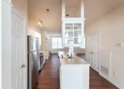 Thumbnail 6 of 147 - This is a photo of the kitchen in the 1498 square foot, 2 bedroom, 2 and 1/2 bath Schooner floor plan at Nantucket Apartments in Loveland, OH.
