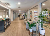 Thumbnail 55 of 62 - The entryway to the Princeton Court leasing office at Princeton Court Apartments in the Vickery Midtown neighborhood of Dallas, TX.