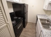 Thumbnail 22 of 78 - This is a photo of the kitchen in a 849 square foot 2 bedroom, 2 bath apartment at Park Lane Apartments in Cincinnati, OH.