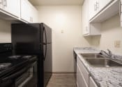 Thumbnail 21 of 78 - This is a photo of the kitchenin a 849 square foot 2 bedroom, 2 bath apartment at Park Lane Apartments in Cincinnati, OH.