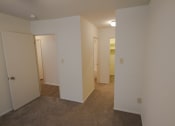 Thumbnail 35 of 78 - This is a photo looking towards the primary bathroom and walk-in closet in the primary bedroom in a 849 square foot 2 bedroom, 2 bath apartment at Park Lane Apartments in Cincinnati, OH.