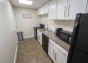 Thumbnail 53 of 78 - This is a photo of the kitchen in the resident social room at Park Lane Apartments in Cincinnati, OH.