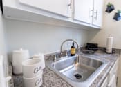 Thumbnail 7 of 29 - This is a picture of the kitchen in a 576 sq foot 1 bedroom, 1 bath apartment at Red Bank Reserve in the Madisonville neighborhood of Cincinnati, Ohio.
