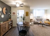Thumbnail 10 of 29 - This is a picture of the dining area and living room in a 576 sq foot 1 bedroom, 1 bath apartment at Red Bank Reserve in the Madisonville neighborhood of Cincinnati, Ohio.