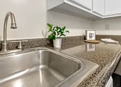 Thumbnail 7 of 38 - This is a photo of the kitchen of a 742 square foot, 2 bedroom apartment at Romaine Court Apartments in the Oakley neighborhood of Cincinnati, Ohio.