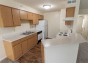 Thumbnail 8 of 98 - This is photo of the kitchen in the 852 square foot, 1 bedroom Fairlawn floor plan at Trails of Saddlebrook Apartments in Florence, KY.