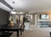 Thumbnail 25 of 98 - This is a photo of the kitchen and living room from the dining room in the 1226 square foot 3 bedroom, 2 bath Hambletonian at Trails of Saddlebrook Apartments in Florence, KY.