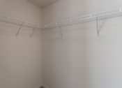 Thumbnail 35 of 98 - This is a photo of the primary bedroom walk-in closet in the 1226 square foot 3 bedroom, 2 bath Hambletonian at Trails of Saddlebrook Apartments in Florence, KY.