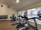 Thumbnail 33 of 44 - The 24-hour fitness center with treadmill, elliptical, free weights and other workout machines at The Summit at Midtown Apartments in Midtown, Dallas, TX.