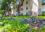 Thumbnail 44 of 44 - Building exteriors and landscaping at The Summit at Midtown Apartments in Midtown, Dallas, TX.