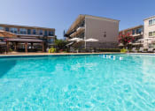 Thumbnail 1 of 34 - This is a photo of the pool area at The Summit at Midtown Apartments in Dallas, TX.