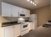 Thumbnail 11 of 75 - This is a photo of the kitchen in the 1170 square foot 2 bedroom, 2 bath Freedom Balcony at Washington Place Apartments in Miamisburg, Ohio in Washington Township.
