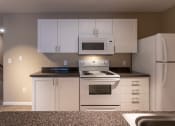 Thumbnail 10 of 75 - This is a photo of the kitchen in the 1170 square foot 2 bedroom, 2 bath Freedom Balcony at Washington Place Apartments in Miamisburg, Ohio in Washington Township.