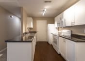 Thumbnail 13 of 75 - This is a photo of the kitchen in the 1040 square foot 2 bedroom, 1 bath Patriot at Washington Place Apartments in Miamisburg, Ohio in Washington Township.