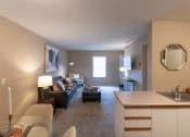 Thumbnail 28 of 75 - This is a photo of the living room from the dining room  of the 890 square foot 2 bedroom, 2 bath Liberty at Washington Place Apartments in in Miamisburg, Ohio in Washington Township.