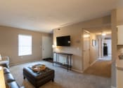 Thumbnail 33 of 75 - This is a photo of the living room and hallway of the 890 square foot 2 bedroom, 2 bath Liberty at Washington Place Apartments in in Miamisburg, Ohio in Washington Township.