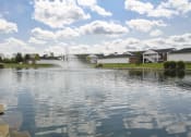 Thumbnail 68 of 75 - This is a photo of a fountain in a pond at Washington Place Apartments in Washington Township, OH
