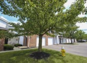 Thumbnail 74 of 75 - This is a photo of some apartment entrances and garages at Washington Place Apartments in Washington Township, OH