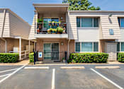 Thumbnail 29 of 31 - Apartment building exterior showing the mail center at Woodbridge Apartments in Midtown, Dallas, TX.