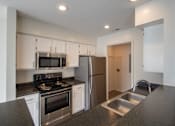 Thumbnail 13 of 57 - This is a photo of the kitchen of the 900 square foot 2 bedroom Miamisburg floor plan at Washington Park Apartments in Centerville, OH.