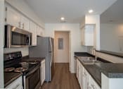 Thumbnail 14 of 57 - This is a photo of the kitchen of the 900 square foot 2 bedroom Miamisburg floor plan at Washington Park Apartments in Centerville, OH.