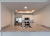 Thumbnail 3 of 57 - This is a photo of the kitchen of the 1500 square foot 3 bedroom, 2 and a half bath with 2-car garage Bellbrook floor plan at Washington Park Apartments in Centerville, OH.